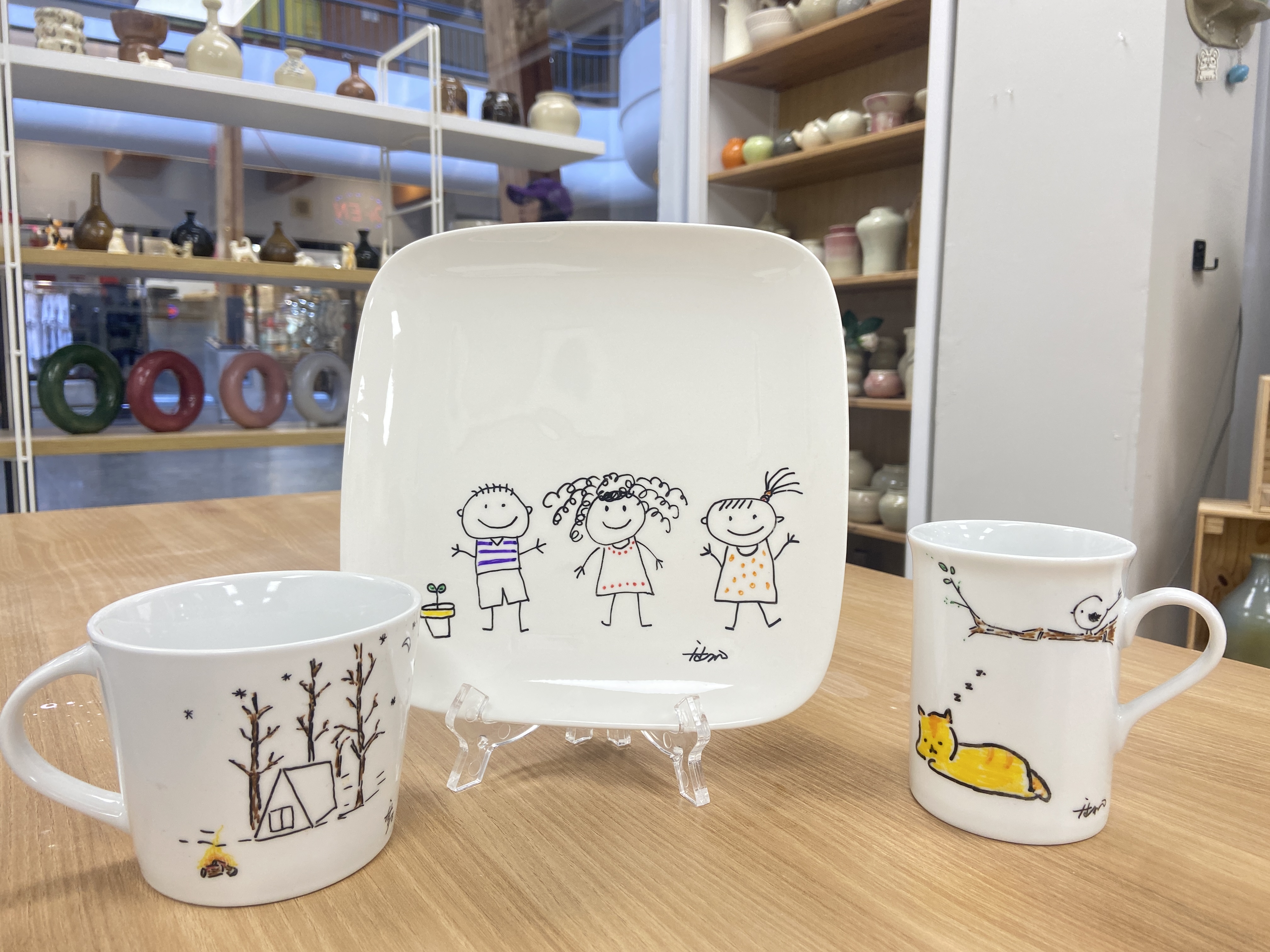Hand-painted ceramic plate and cups